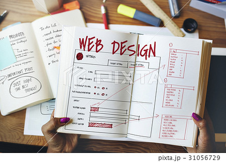 Hands working on notebook network graphic overlay Hands working on notebook network graphic overlay 31056729
