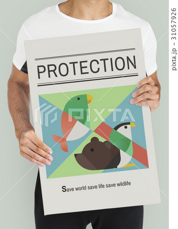 Adult person holding a save the animals banner 31057926