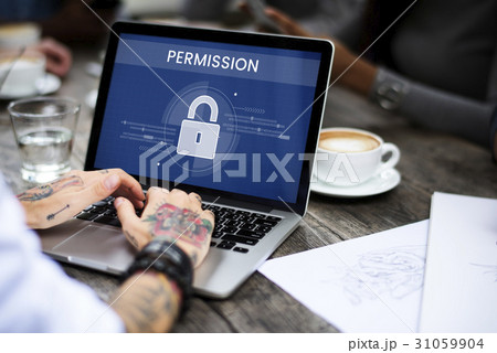 Hands working on laptop network graphic overlay 31059904