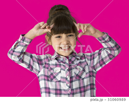 A little girl with a cheerful smile A little girl with a cheerful smile 31060989