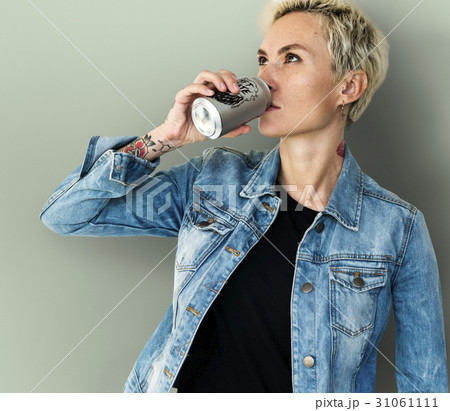Adult Woman Drinking Beverage from Can 31061111