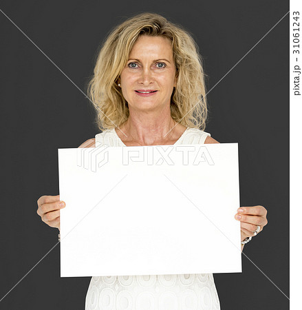 Caucasian blonde woman holding placard Caucasian blonde woman holding placard 31061243