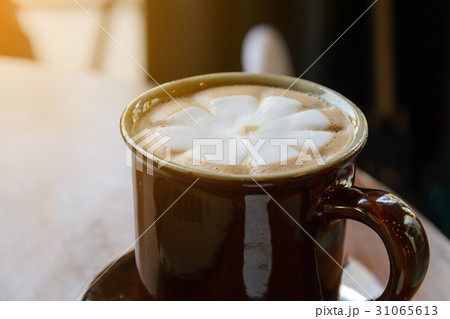 Hot cappuccino coffee in coffee shop 31065613