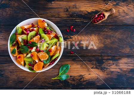 Vegetarian low-calorie salad with fresh fruits 31066188