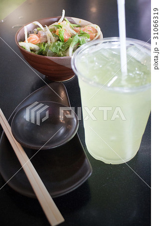 Salmon Spicy Salad And Cold Green Tea Drink Salmon Spicy Salad And Cold Green Tea Drink 31066319