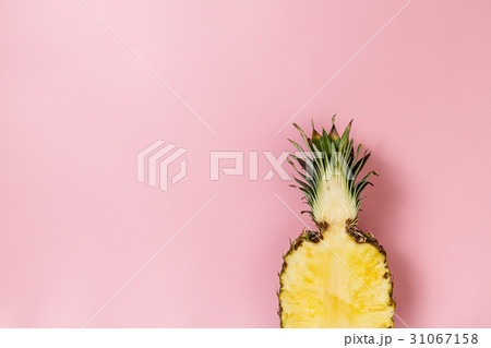 Half slice of fresh appetizing tasty pineapple Half slice of fresh appetizing tasty pineapple 31067158
