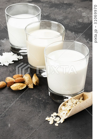 Vegan oat, almond, coconut milk in glass Vegan oat, almond, coconut milk in glass 31069970