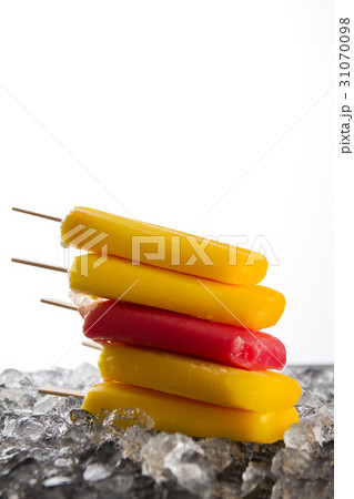 Tasty cold fresh appetizing ice cream on stick Tasty cold fresh appetizing ice cream on stick 31070098