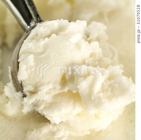 Tasty appetizing pure vanilla creamy ice cream Tasty appetizing pure vanilla creamy ice cream 31070528