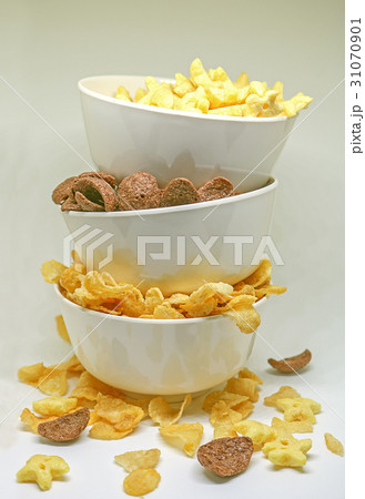 Cornflake cereals in a white bowl. Cornflake cereals in a white bowl. 31070901