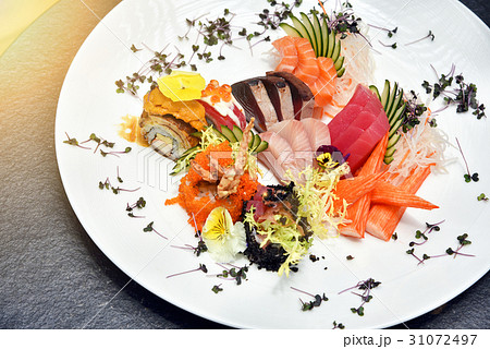 Japanese food, Fresh fish sashimi and rice roll. Japanese food, Fresh fish sashimi and rice roll. 31072497