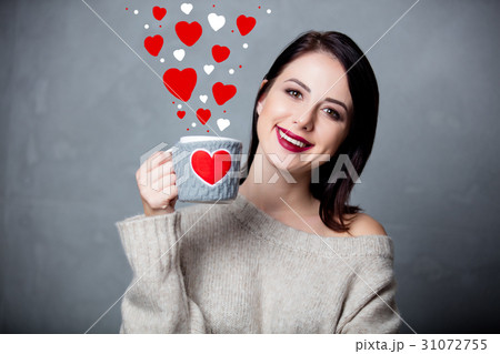young woman with cup of coffee young woman with cup of coffee 31072755