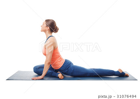 Woman doing yoga asana Eka pada kapotasana 31076494