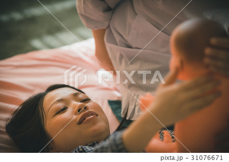 woman during pregnancy or shortly after childbirth 31076671