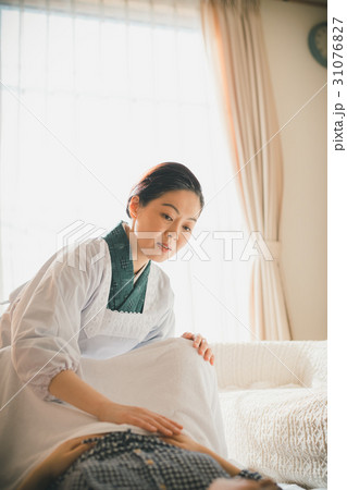 woman during pregnancy or shortly after childbirth 31076827