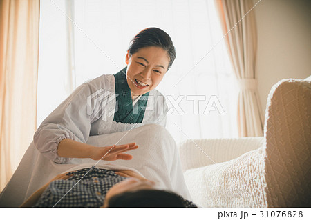 woman during pregnancy or shortly after childbirth 31076828