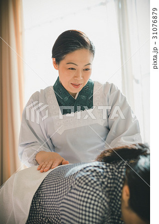 woman during pregnancy or shortly after childbirth 31076879