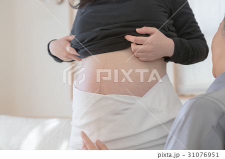 woman during pregnancy or shortly after childbirth woman during pregnancy or shortly after childbirth 31076951