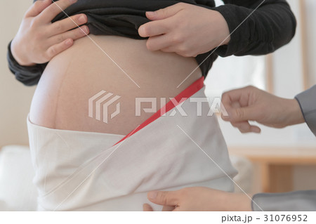 woman during pregnancy or shortly after childbirth woman during pregnancy or shortly after childbirth 31076952