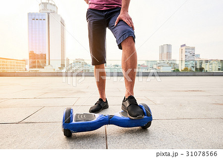 Male legs and hoverboard. Male legs and hoverboard. 31078566