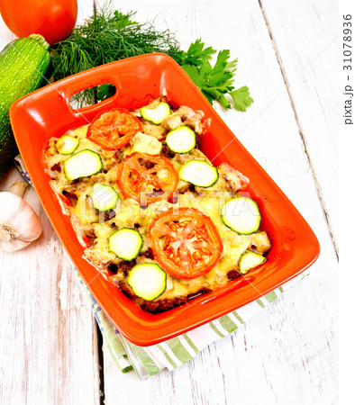 Casserole from minced meat and zucchini in brazier Casserole from minced meat and zucchini in brazier 31078936