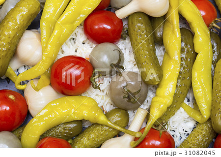 Background of pickled cucumbers, tomatoes, garlic, 31082045