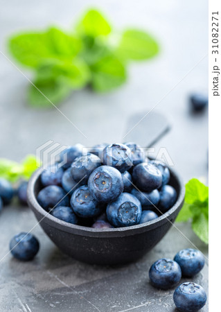 Fresh Blueberries in a bowl on dark background 31082271