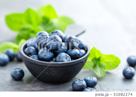 Fresh Blueberries in a bowl on dark background 31082274