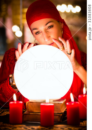 Fortuneteller at Seance with Crystal ball 31083608