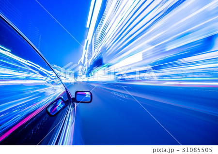 View from Side of Car moving in a night city View from Side of Car moving in a night city 31085505