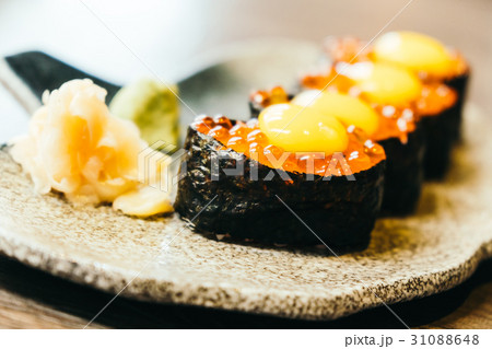 Sushi with salmon eggs Sushi with salmon eggs 31088648