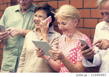 Senior Adult Use Tablet Mobile Phone Technology Senior Adult Use Tablet Mobile Phone Technology 31090965