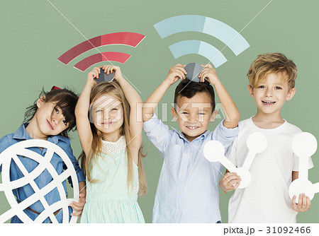 Little Children Holding Technology Symbols Little Children Holding Technology Symbols 31092466
