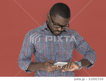 African descent is using smartphone African descent is using smartphone 31092550