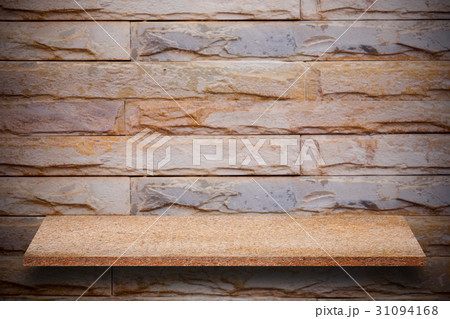 Empty top of natural stone shelves and stone wall  31094168