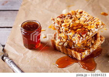 Caramel tart with nuts, maple syrup and honey. 31094323