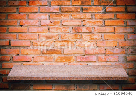 Empty top of natural stone shelves and stone wall 31094646