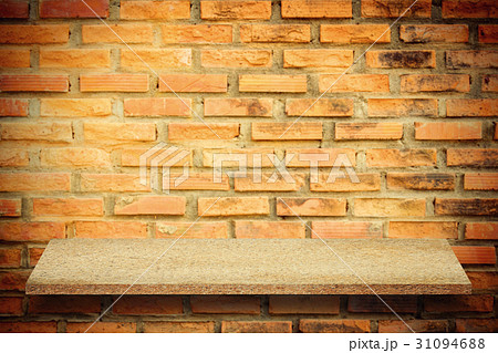 Empty top of natural stone shelves and stone wall 31094688