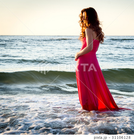 Woman standing on the sea Woman standing on the sea 31106128