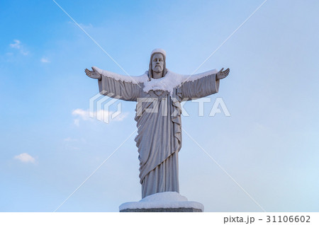 Christ statue in winter. 31106602