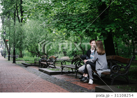Romantic couple on bench Romantic couple on bench 31108254