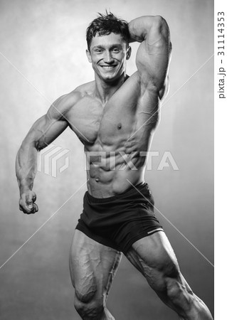 Caucasian sexy fitness model in gym close up abs. Caucasian sexy fitness model in gym close up abs. 31114353