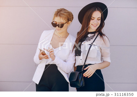 beautiful young girls outdoors in Sunny weather beautiful young girls outdoors in Sunny weather 31116350