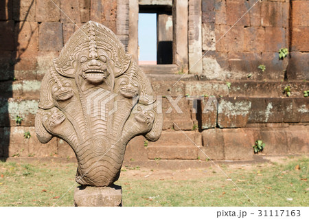 Stone nago statue. 31117163