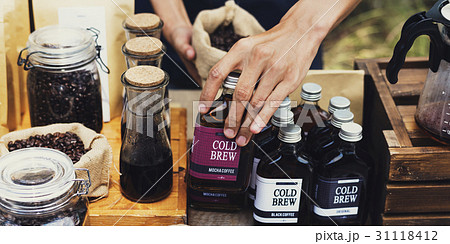People Hands Displaying Coffee Products 31118412
