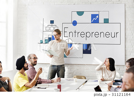 People working on white board network graphic overlay People working on white board network graphic overlay 31121164