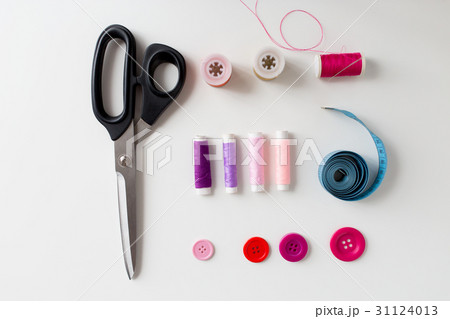 scissors, sewing buttons, threads and tape measure scissors, sewing buttons, threads and tape measure 31124013