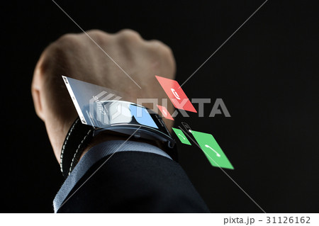 close up of businessman hand with smartwatch close up of businessman hand with smartwatch 31126162