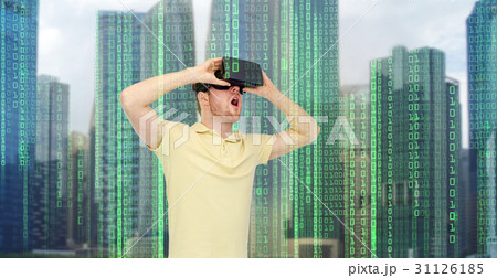 happy man in virtual reality headset or 3d glasses happy man in virtual reality headset or 3d glasses 31126185