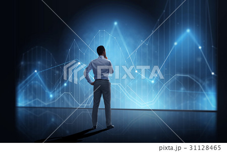 businessman looking at virtual diagram chart 31128465